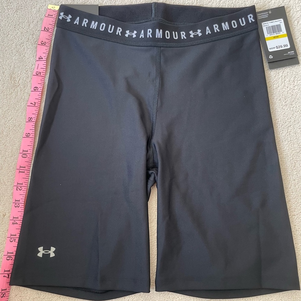 Woman’s Under Armour Black Heatgear compression high rise bike shorts